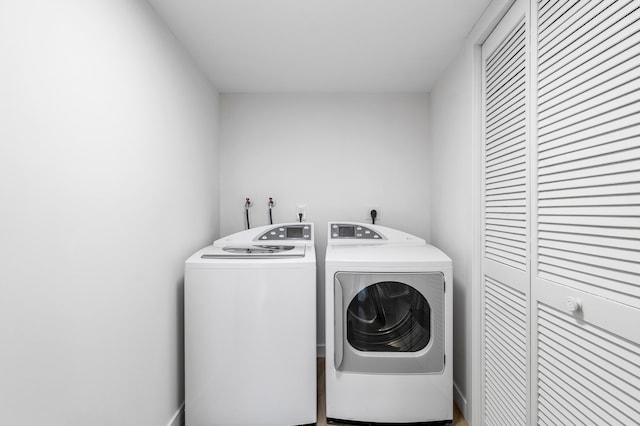 3360 S Ocean Blvd Unit 5Fii, Palm Beach, FL 33480 - laundry room with washing machine and dryer