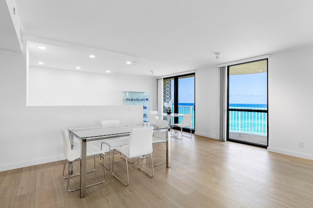 3360 S Ocean Blvd Unit 5Fii, Palm Beach, FL 33480 - dining area with expansive windows, recessed lighting, wood finished floors, and baseboards