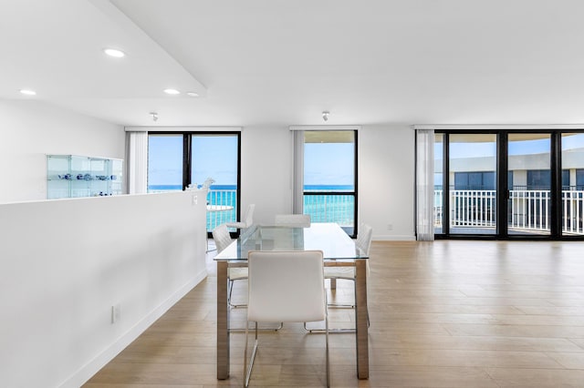 3360 S Ocean Blvd Unit 5Fii, Palm Beach, FL 33480 - dining area featuring plenty of natural light, light wood finished floors, recessed lighting, and baseboards
