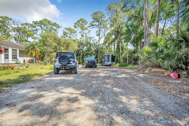 view of parking with driveway