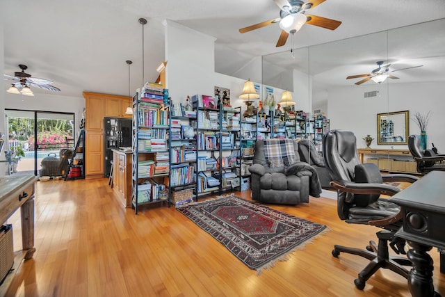 office featuring a ceiling fan and light wood-style floors