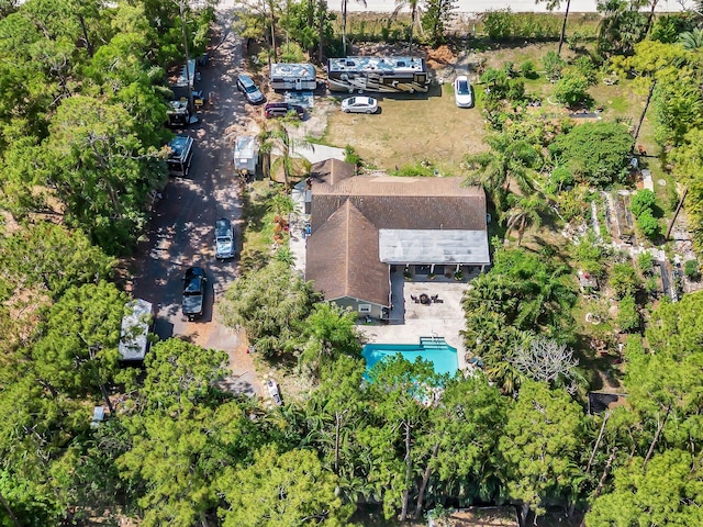 view of property location featuring a pool