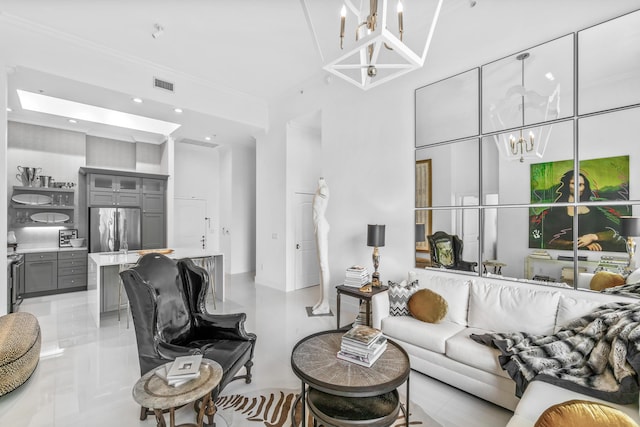 living area featuring a chandelier, ornamental molding, a towering ceiling, recessed lighting, and light tile patterned flooring
