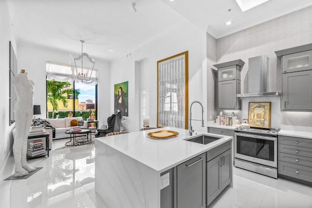 kitchen with gray cabinets, electric range, wall chimney range hood, a sink, and ornamental molding