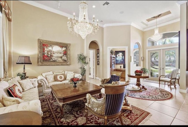 common area featuring crown molding and a towering ceiling