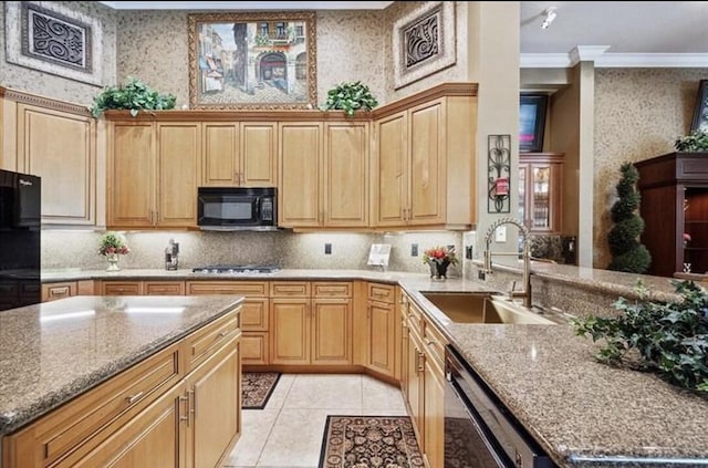kitchen featuring black appliances, a sink, ornamental molding, light stone countertops, and light tile patterned floors