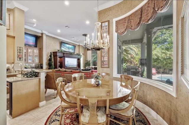 dining room with plenty of natural light, ornamental molding, recessed lighting, and light tile patterned floors
