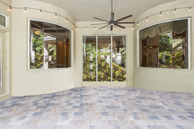 view of patio / terrace with ceiling fan