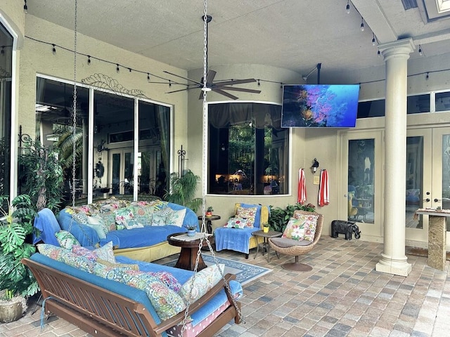 view of patio with french doors, an outdoor hangout area, and ceiling fan
