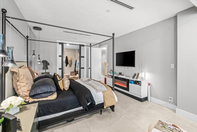 bedroom featuring baseboards