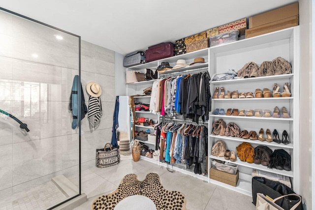 spacious closet featuring tile patterned floors