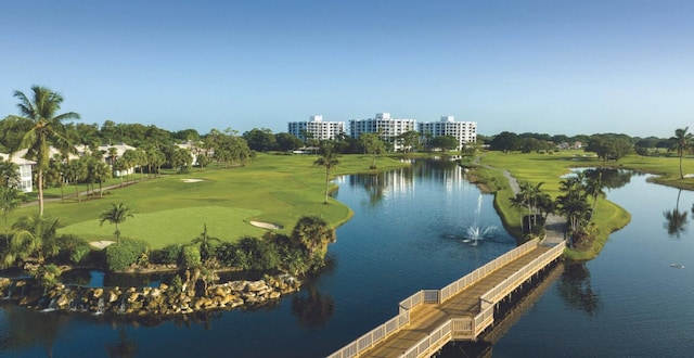bird's eye view of a nearby body of water and a golf club