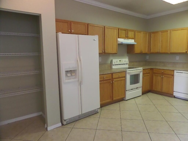 kitchen with white appliances, under cabinet range hood, crown molding, light countertops, and light tile patterned flooring
