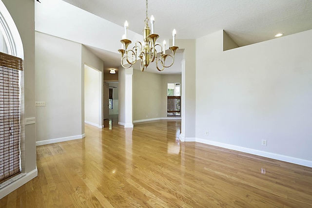 227 Shorewood Way, Jupiter, FL 33458 - unfurnished room featuring a chandelier, light wood-style flooring, baseboards, and recessed lighting