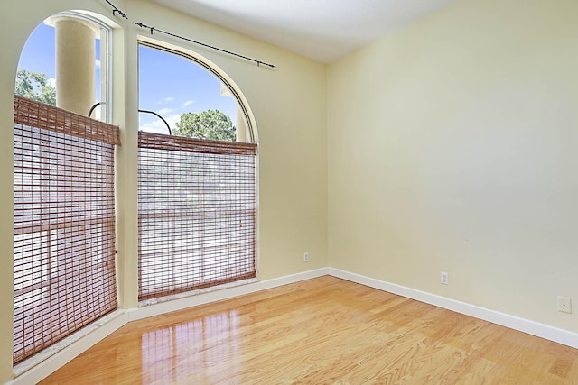 227 Shorewood Way, Jupiter, FL 33458 - unfurnished room with wood finished floors and baseboards
