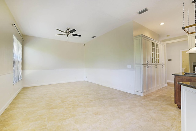 227 Shorewood Way, Jupiter, FL 33458 - spare room with a ceiling fan, baseboards, recessed lighting, and a fireplace