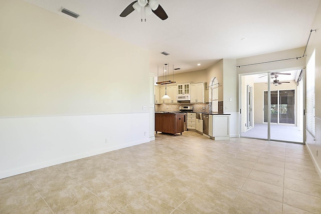 227 Shorewood Way, Jupiter, FL 33458 - unfurnished living room featuring ceiling fan, baseboards, and light tile patterned floors