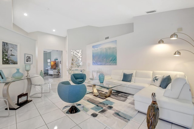 living area with light tile patterned flooring and recessed lighting
