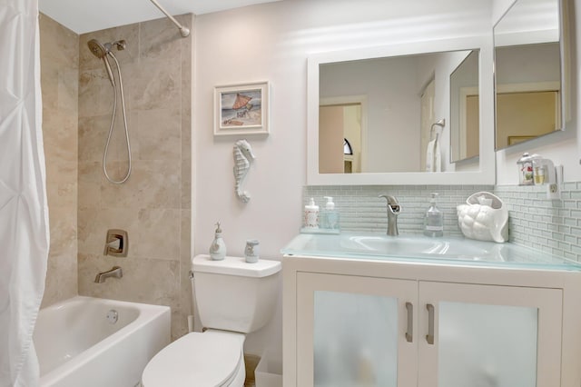 bathroom with tasteful backsplash, toilet, shower / tub combo with curtain, and vanity