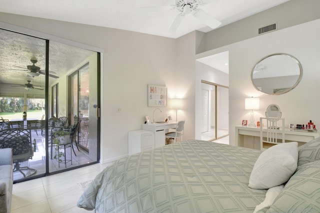 bedroom featuring access to outside, light tile patterned flooring, a closet, baseboards, and a ceiling fan