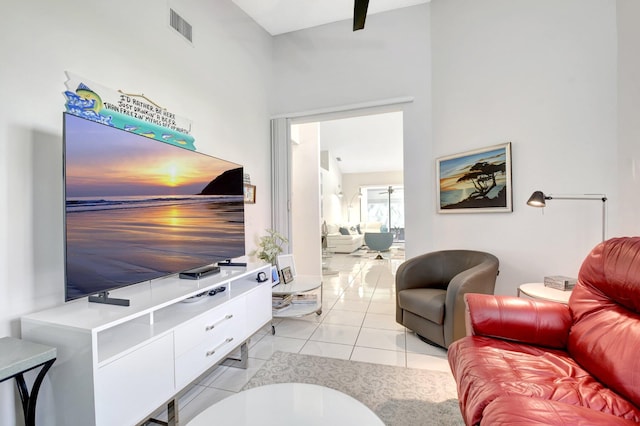 living room with light tile patterned floors