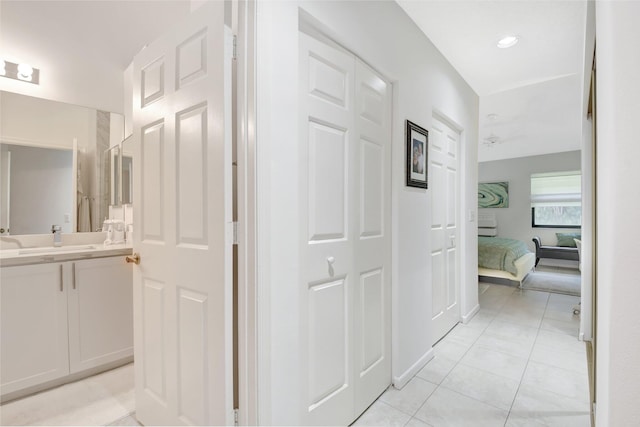 hallway with light tile patterned flooring