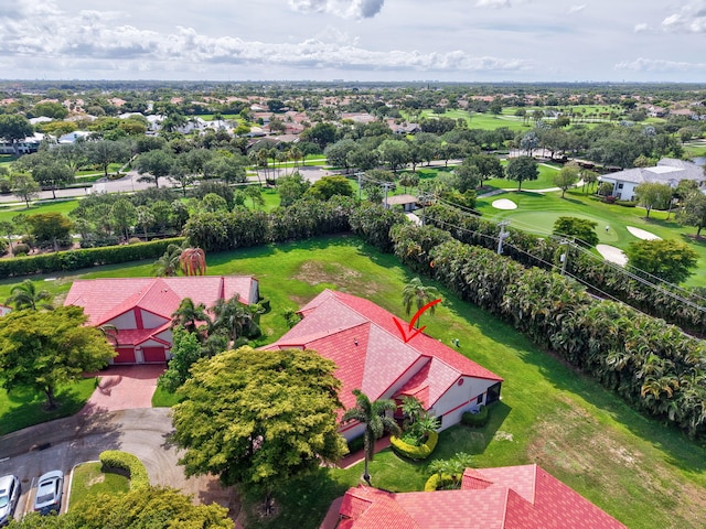 aerial view of residential area with a golf course