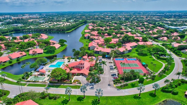 aerial perspective of suburban area featuring a large body of water