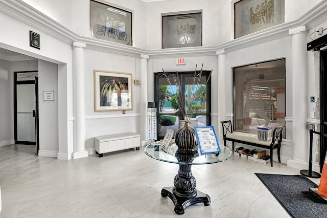 common area with a towering ceiling