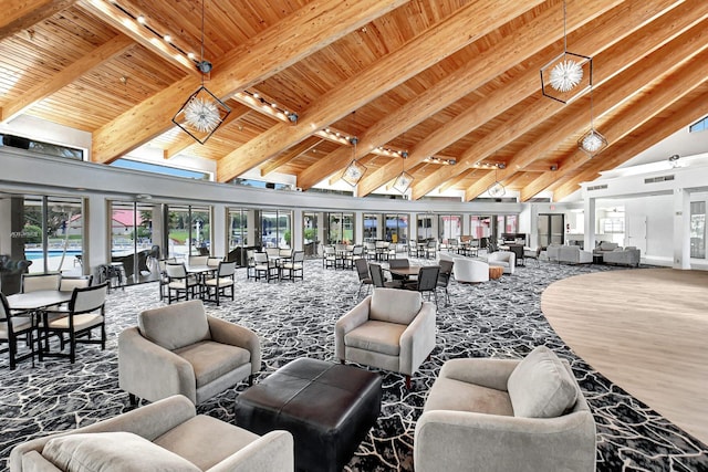 community lobby with high vaulted ceiling, wooden ceiling, and beamed ceiling