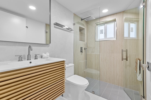969 Normandy U, Delray Beach, FL 33484 - bathroom with toilet, a shower stall, and vanity