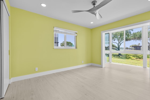 969 Normandy U, Delray Beach, FL 33484 - unfurnished room with wood finished floors, baseboards, ceiling fan, and recessed lighting
