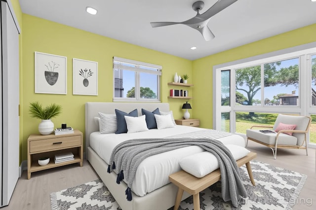 969 Normandy U, Delray Beach, FL 33484 - bedroom featuring ceiling fan, light wood-style flooring, and recessed lighting