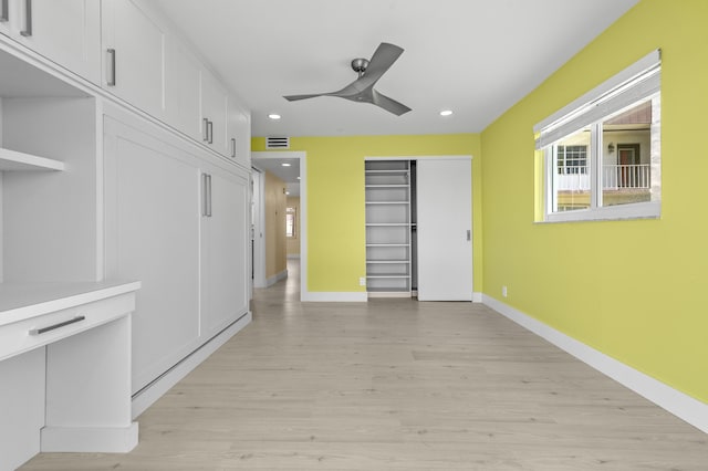 969 Normandy U, Delray Beach, FL 33484 - empty room featuring light wood finished floors, baseboards, ceiling fan, and recessed lighting
