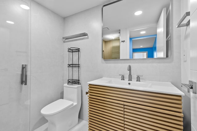 969 Normandy U, Delray Beach, FL 33484 - full bathroom with toilet, vanity, and a shower with door