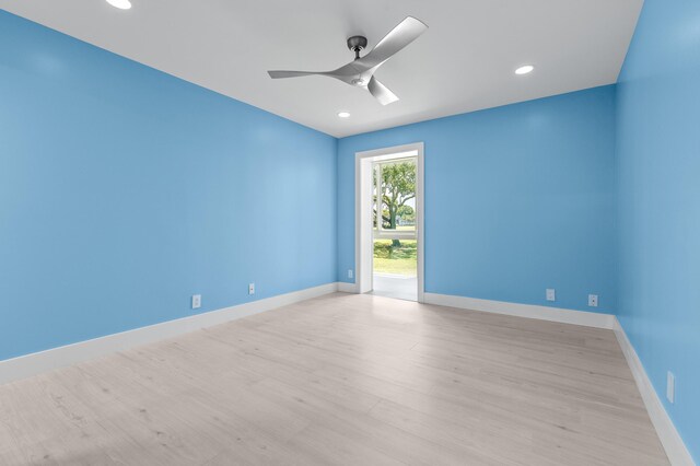 969 Normandy U, Delray Beach, FL 33484 - empty room with light wood-type flooring, ceiling fan, recessed lighting, and baseboards
