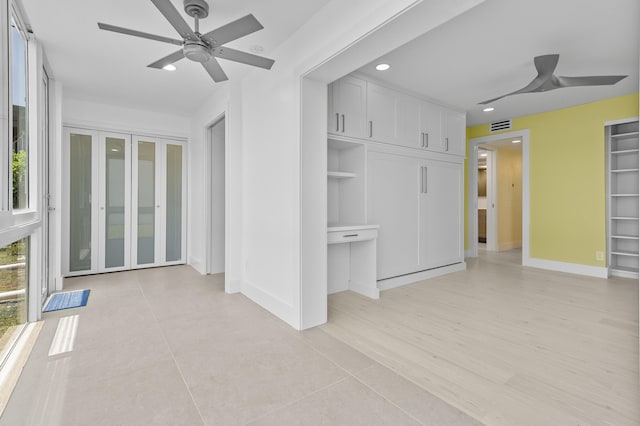 969 Normandy U, Delray Beach, FL 33484 - unfurnished bedroom with baseboards, recessed lighting, a ceiling fan, and light tile patterned flooring