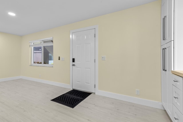 969 Normandy U, Delray Beach, FL 33484 - foyer with light wood-style flooring, baseboards, and recessed lighting