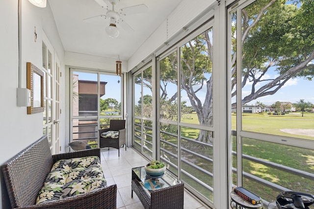 sunroom / solarium with ceiling fan