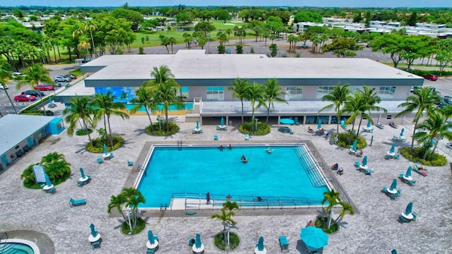 drone / aerial view of a pool area