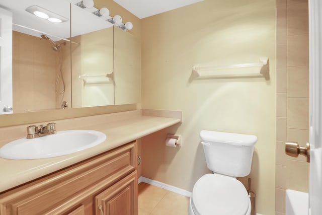 full bathroom featuring toilet, tile patterned flooring, vanity, and baseboards