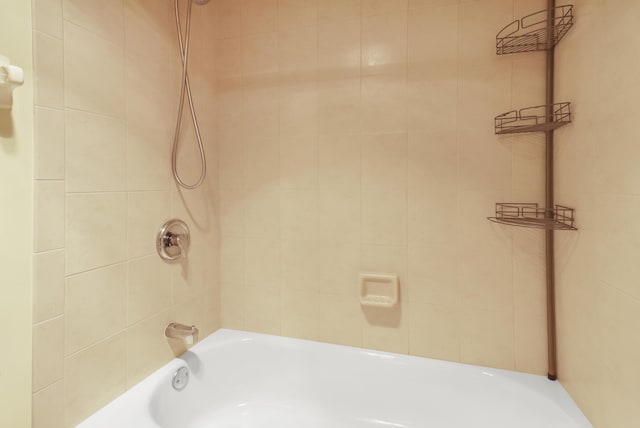 full bath featuring bathtub / shower combination