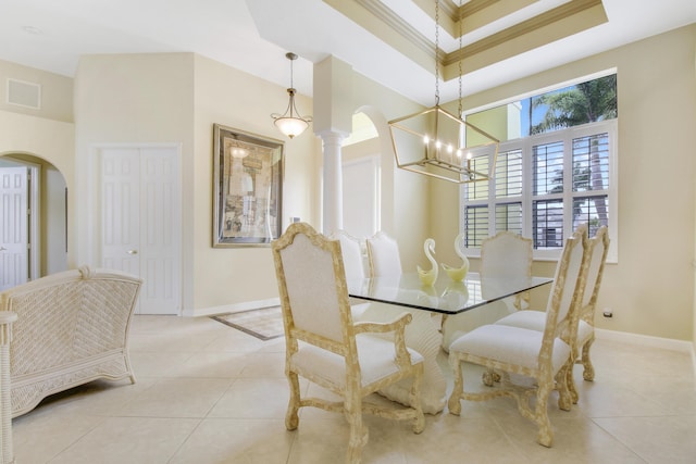 dining area with arched walkways, a chandelier, light tile patterned flooring, baseboards, and a high ceiling