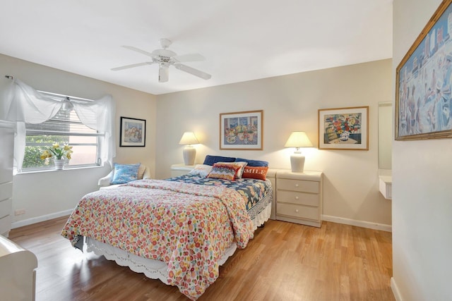5200 Privet B Pl Unit B, Delray Beach, FL 33484 - bedroom featuring baseboards, light wood-type flooring, and a ceiling fan