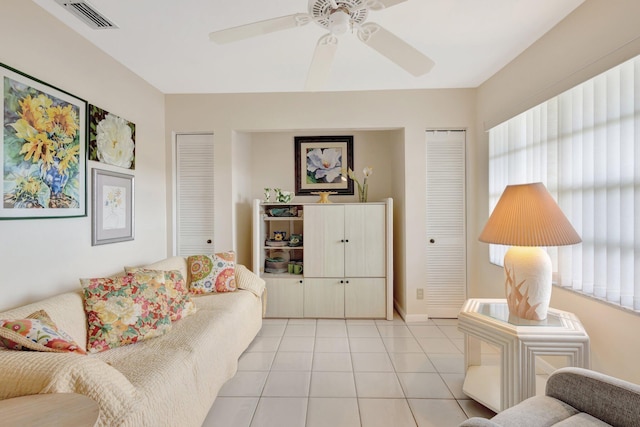 5200 Privet B Pl Unit B, Delray Beach, FL 33484 - living area featuring light tile patterned flooring, a ceiling fan, and baseboards