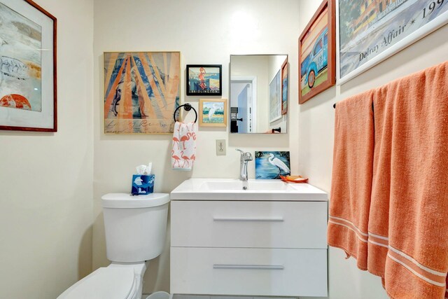 5200 Privet B Pl Unit B, Delray Beach, FL 33484 - half bathroom with toilet and vanity