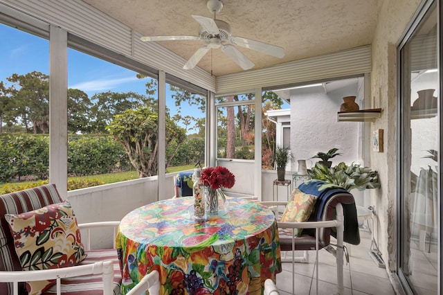 5200 Privet B Pl Unit B, Delray Beach, FL 33484 - sunroom / solarium featuring a ceiling fan, healthy amount of natural light, and outdoor dining area
