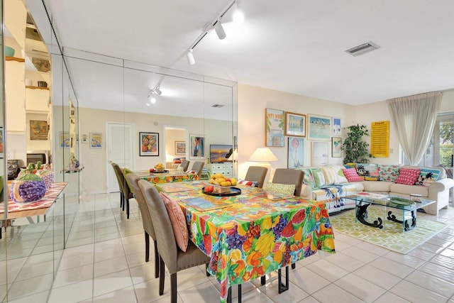 5200 Privet B Pl Unit B, Delray Beach, FL 33484 - dining space featuring rail lighting and light tile patterned flooring
