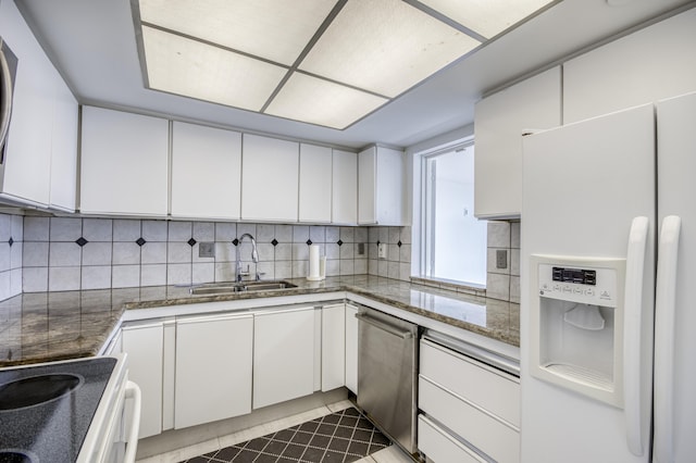 123 Lakeshore Dr Unit 1644, North Palm Beach, FL 33408 - kitchen with white refrigerator with ice dispenser, a sink, dishwasher, electric range, and white cabinets