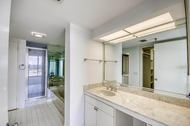 123 Lakeshore Dr Unit 1644, North Palm Beach, FL 33408 - full bathroom featuring vanity, a bath, tile patterned flooring, a closet, and a shower